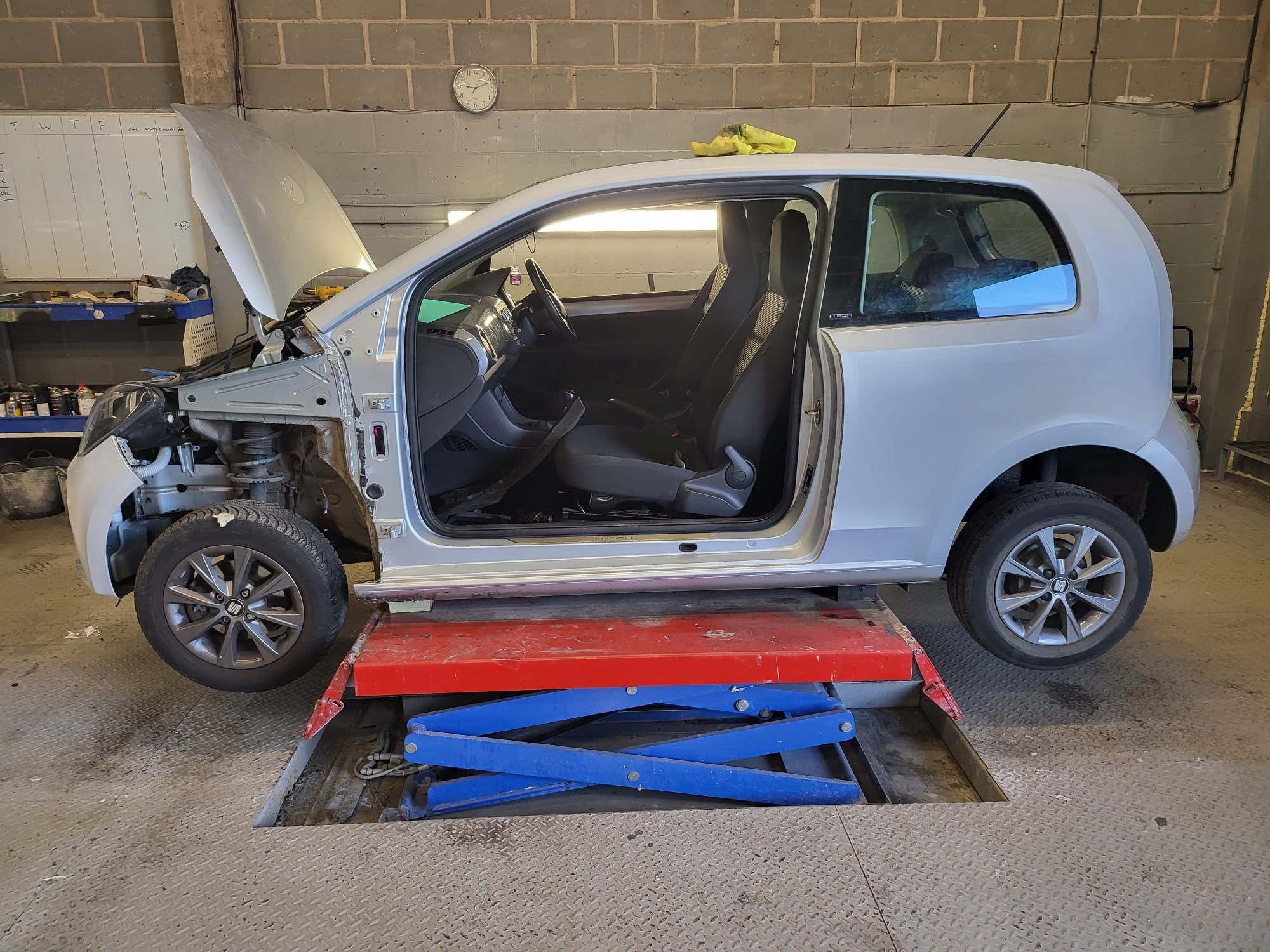 choose your repairer for an insurance claim. car showing body work being done
